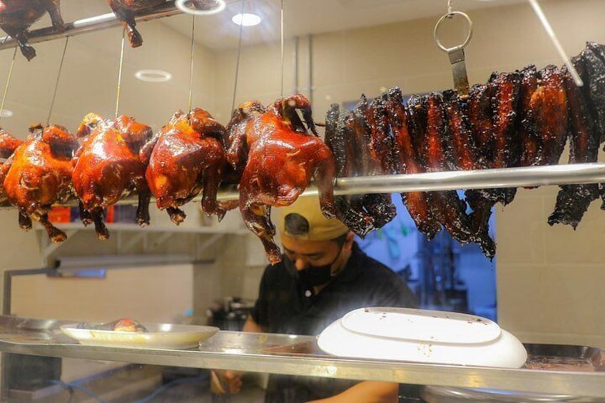 Indulge in the smoky perfection of our grilled meat dish, a savory delight that ignites your taste buds on our food tour. 5