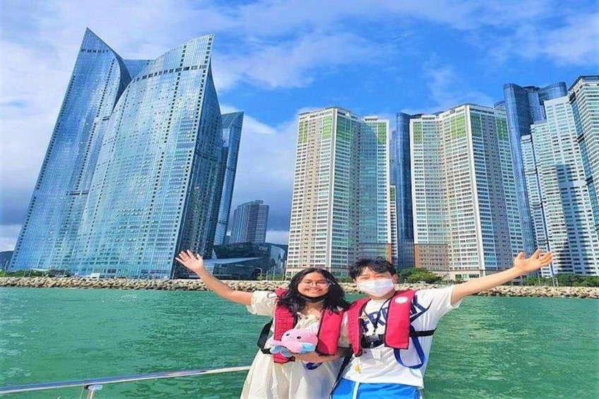 A river with modern skyscrapers in the background. 3
