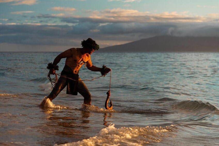 A person surfing on a wave at sunset. 4