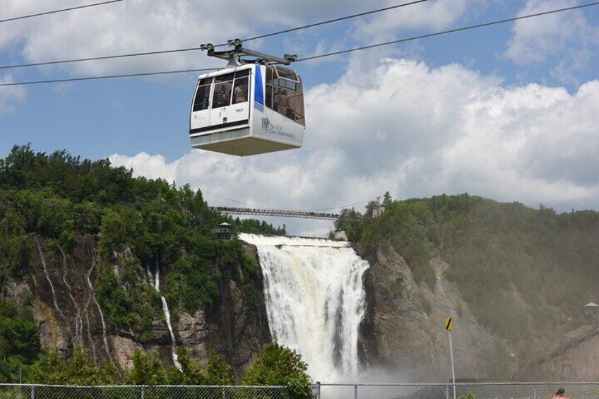 A cable car over a waterfall. 4