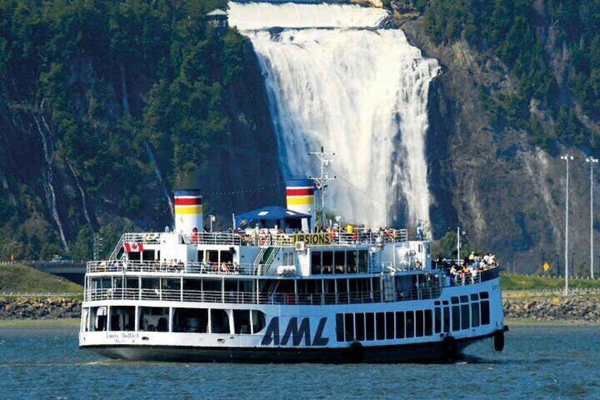 A boat with 'PAM' and 'PAMAL' on its side, with a waterfall in the background. 3