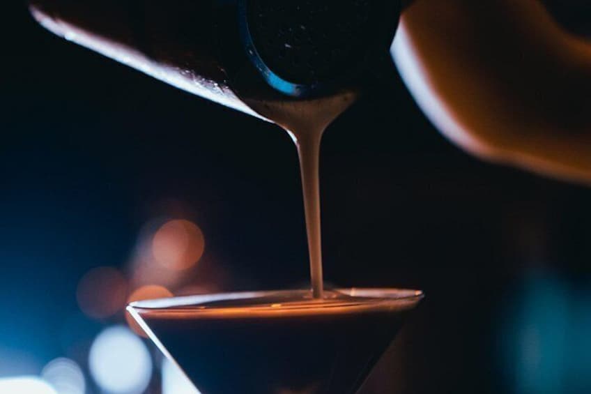 A liquid being poured into a glass. 3