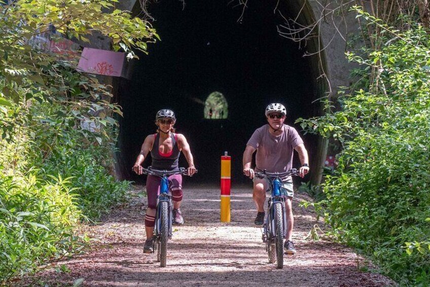 Riding away from the 520M long Glow Worm tunnel.