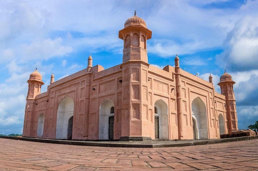 A large pink building with domes and arches, likely a historical monument. 2