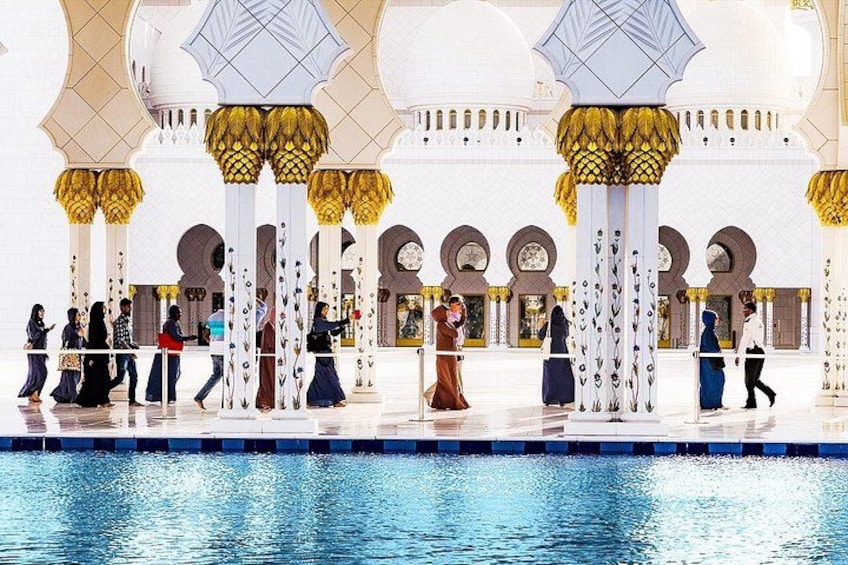 Reflecting serenity: The tranquil waters in front of the Sheikh Zayed Mosque 3