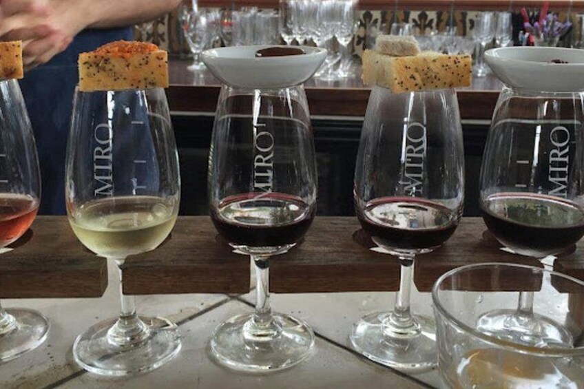 Wine glasses with corks on a bar counter. 2