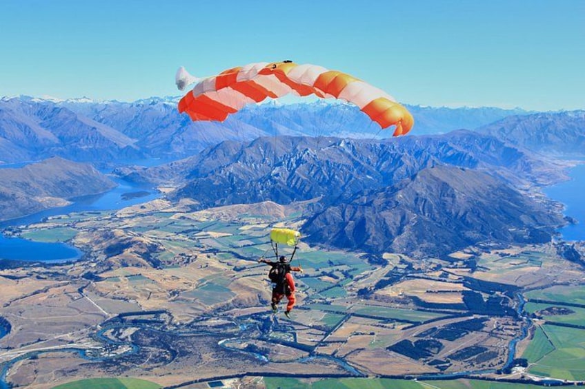 Experience stunning views of Lake Wanaka (left) and Lake Hawea (right) 1