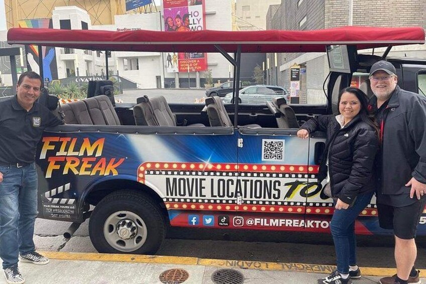 A vehicle with 'FILM FREAK' and 'MOVIE LOCATIONS' text, a QR code, and social media handles. 1