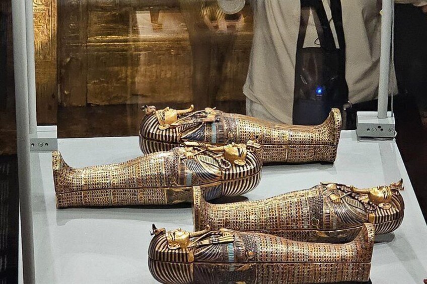 Sarcophagi with intricate designs and hieroglyphs. 2