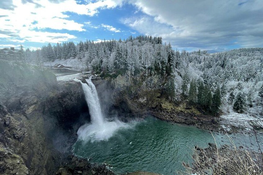 A waterfall, forest, and river. 2