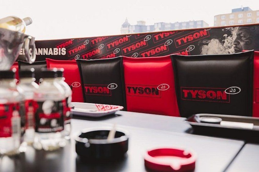 A table with cannabis products and branded bags. 5