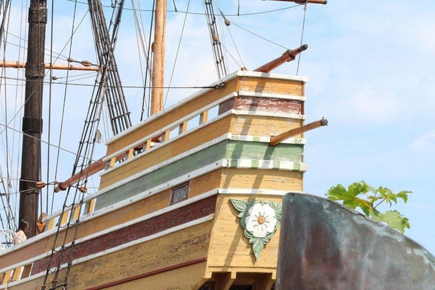 A model ship with multiple masts and a detailed rigging system. 5