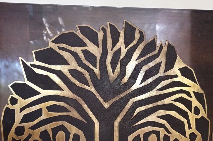 A black and gold tree design. 2