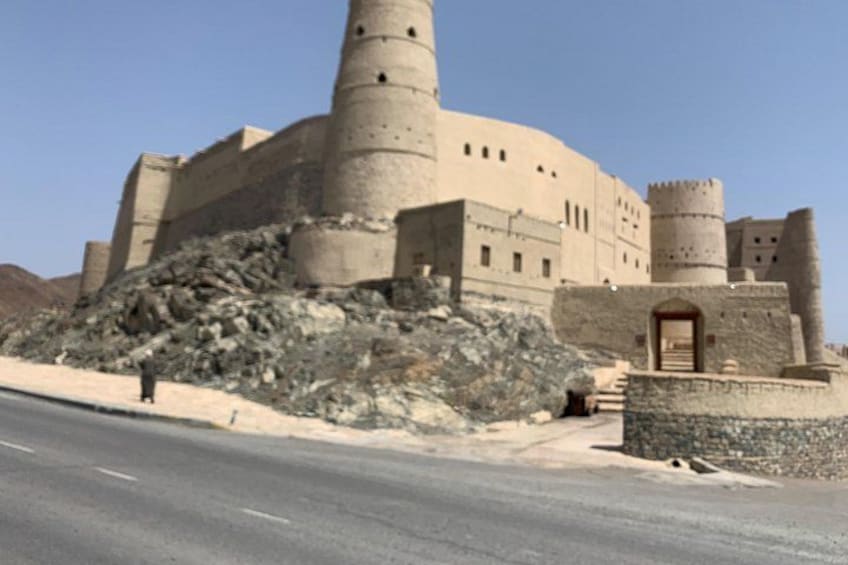 A large, ancient fortress with multiple towers and a prominent entrance. 4