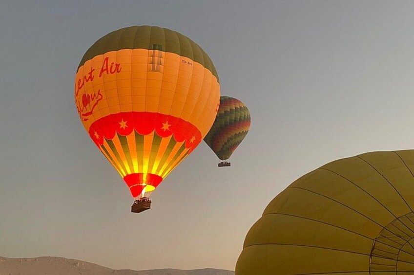 Hot air balloons with 'Kent Air' written on one. 3