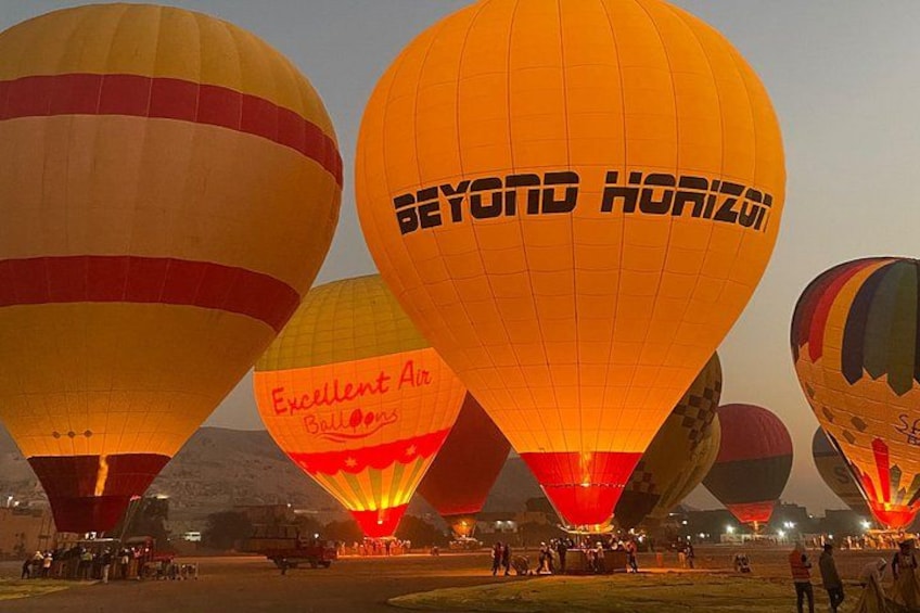 Hot air balloons with 'Excellent Air Balloons' and 'Beyond Horizon' text. 2