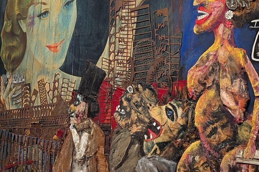 A mural with various figures and abstract designs. 4