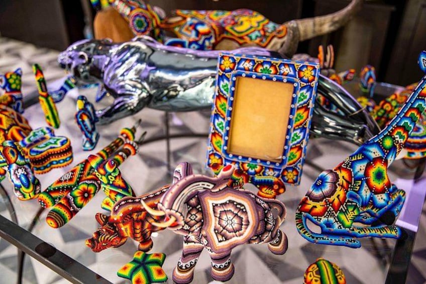 A collection of colorful, intricately designed glass sculptures. 2