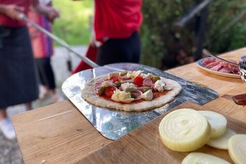 Preparing the pizza paletta