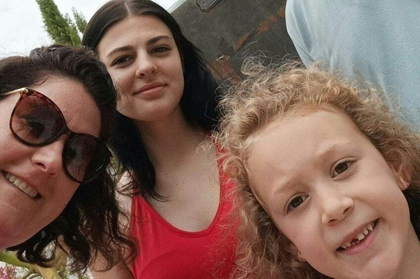 Three people close together. 5
