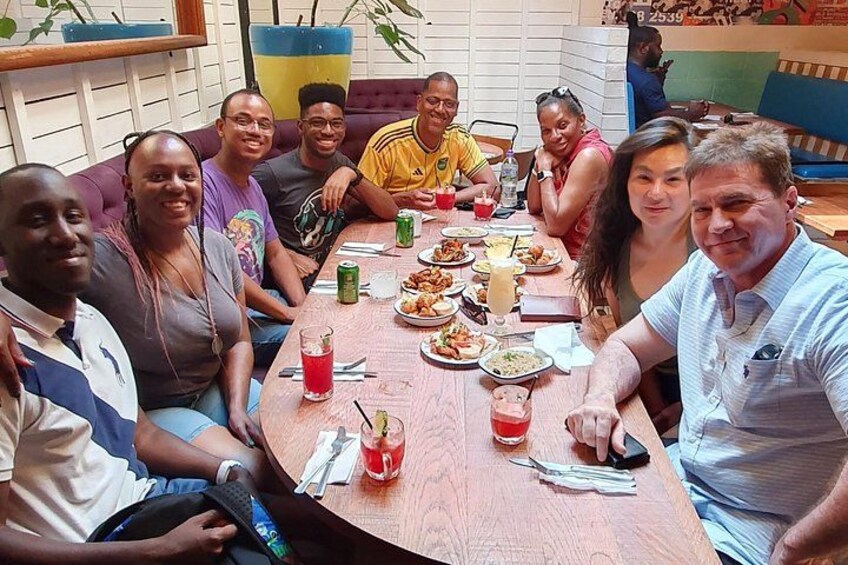 Amazing group tour enjoying a Caribbean Tasting Lunch... Jerk Chicken, Curry Mutton, Jerk Pork, Rice & Peas, Saltfish Fritter and Rum Punch to wash it down 2