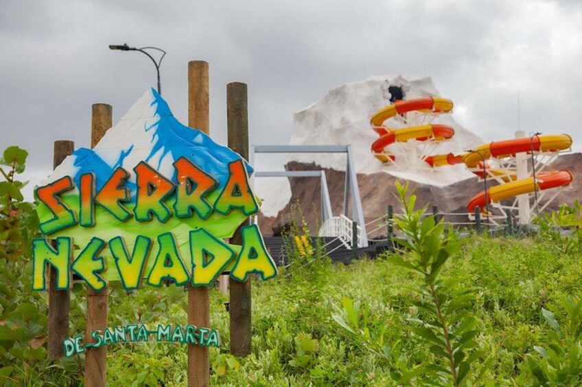A sign for Sierra Nevada with water slides in the background. 3