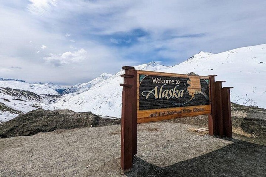 Welcome to Alaska sign at the Summit 5