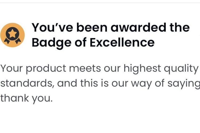 A badge of excellence with text and a star icon. 2
