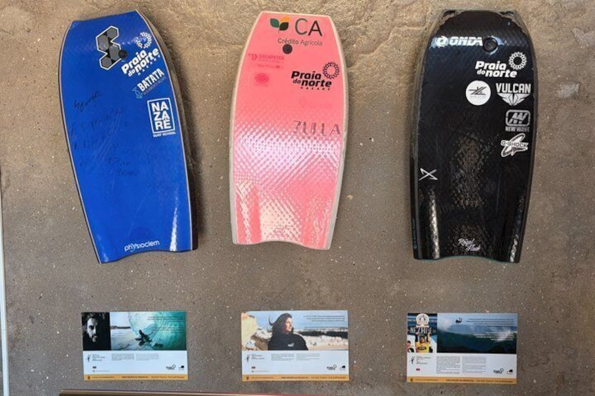 Three surfboards with logos and text, and three posters with images and text. 4
