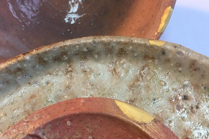 A close-up of a rusty metal surface with visible corrosion and discoloration. 2