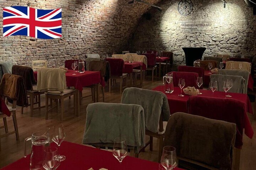 Wine tasting in the dark in historical cellar from 17th century. 3