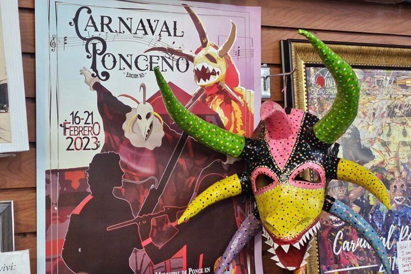Un cartel llamativo con un personaje caricaturesco y texto para 'Carnaval Ponceno 2023' del 16 al 21 de febrero. 3