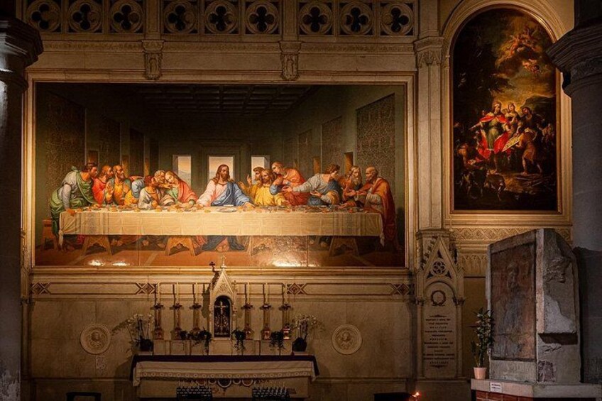 A painting of The Last Supper with a detailed architectural background. 2
