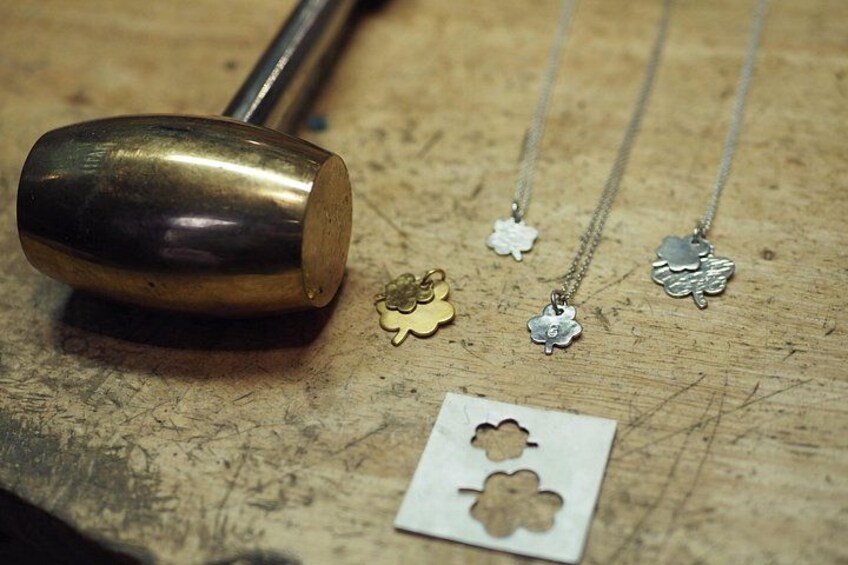 Making charms. 5