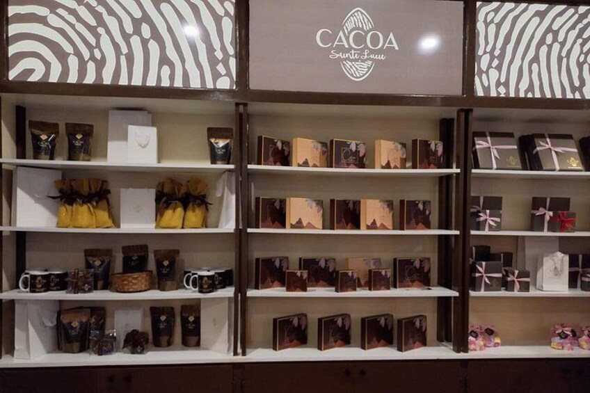 Shelves with various chocolate products and gift boxes. 3