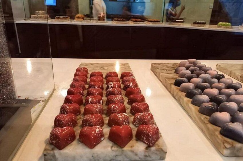 A display of assorted chocolates in a store. 2