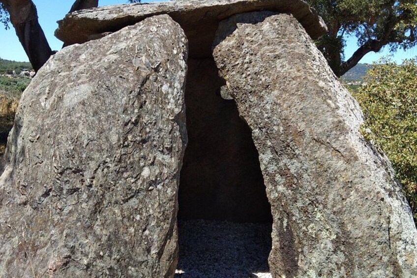 A large stone structure with a narrow passageway. 4