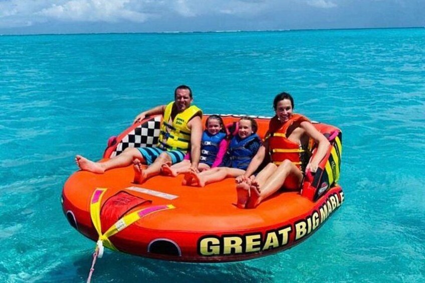 Tubing on grace bay beach Turks and caicos islands 4