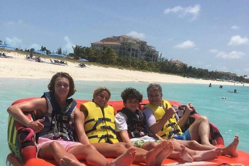 Tubing on grace bay beach Turks and caicos islands 2