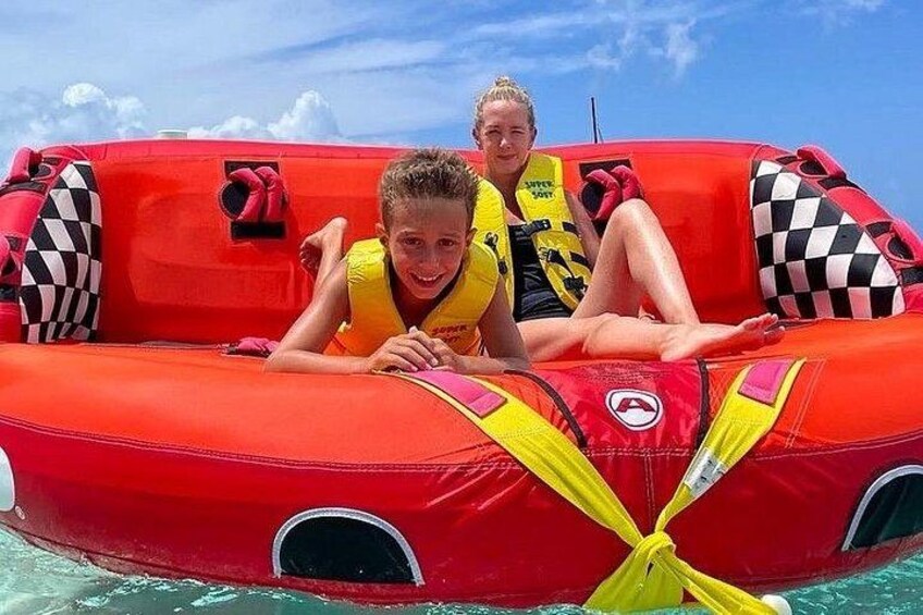 Tubing on grace bay beach Turks and caicos islands 1