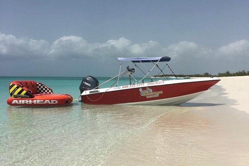 Tubing on grace bay beach Turks and caicos islands 2