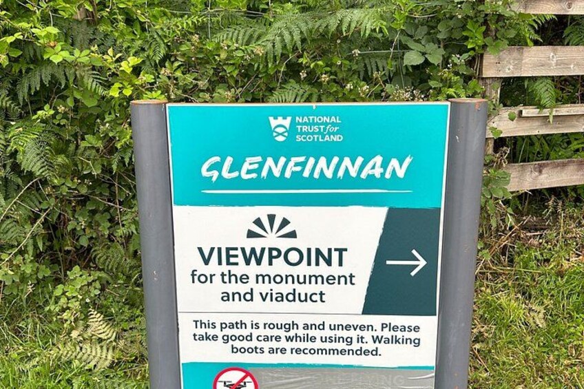 A sign for Glenfinnan Viewpoint for the monument and viaduct. 5