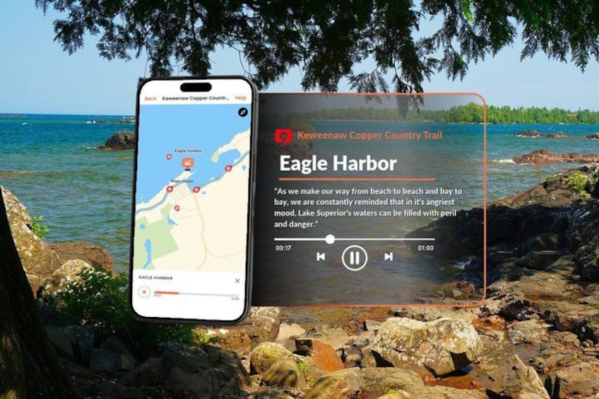 A smartphone displaying a map with a location marked as Eagle Harbor, alongside a printed map with a similar view of the area. 4