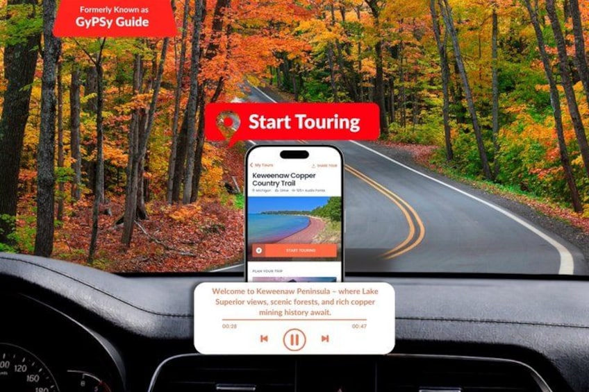 A smartphone mounted on a car dashboard displaying a scenic route on a country trail. 1