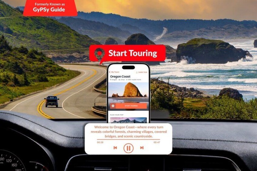 Un teléfono inteligente sujeto al tablero de un coche, con una vista panorámica de la costa de Oregón. 1