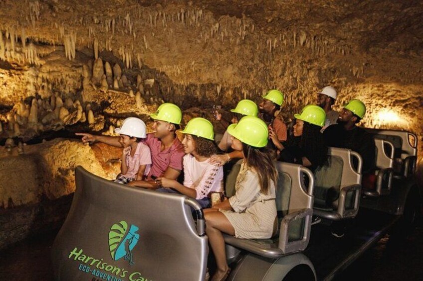 Guests onboard an electric tram going through Harrison's Cave at the Harrison's Cave Eco-Adventure Park 1