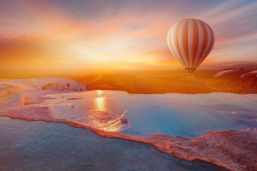 Un globo aerostático sobre un paisaje helado con un atardecer. 1