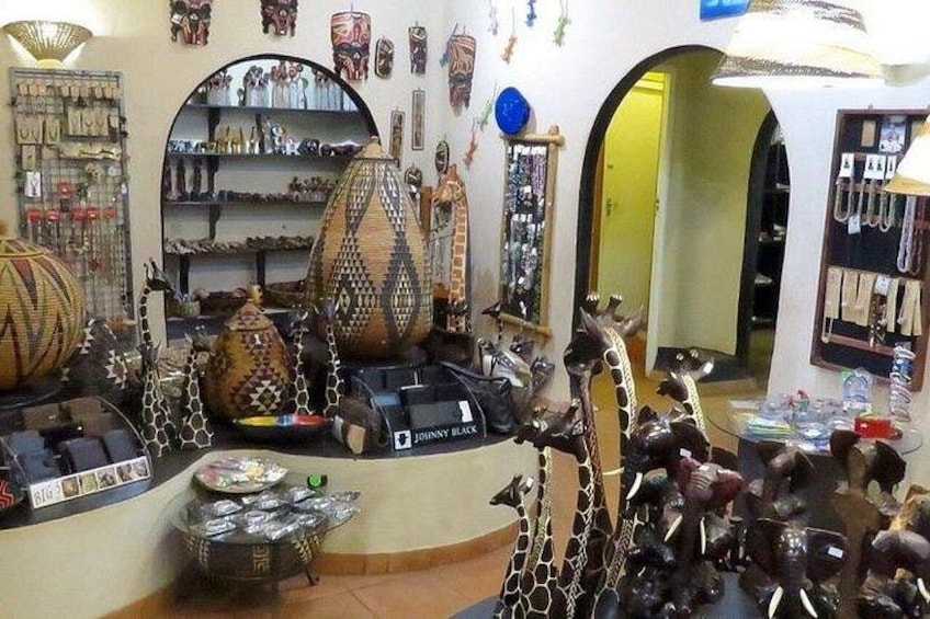 A jewelry store with various items on display, including necklaces and decorative pieces. 4
