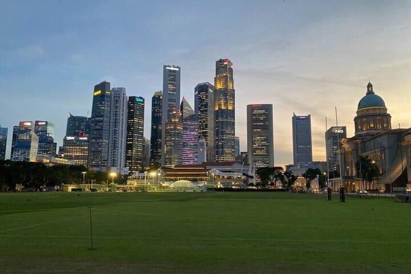 A city skyline with modern skyscrapers and a large dome-shaped building. 3