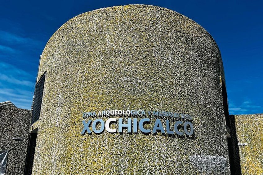 A stone structure with inscriptions. 1